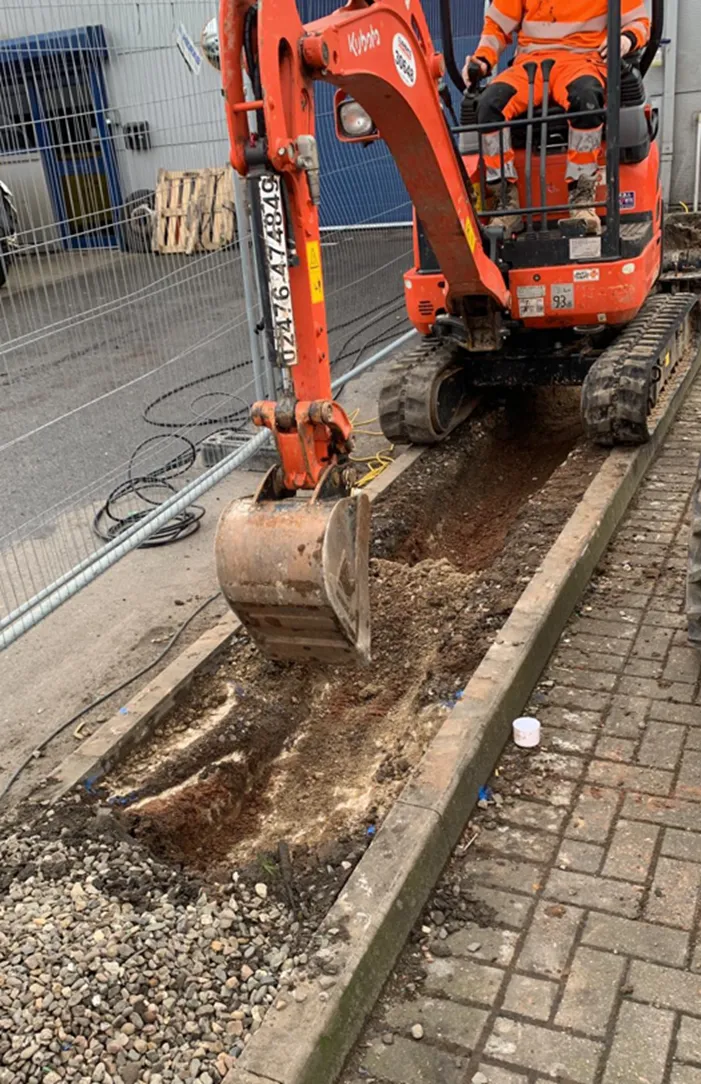 Excavation of cable trench for EV charging ducting by MARA Electrical — fleet EV charging infrastructure installation