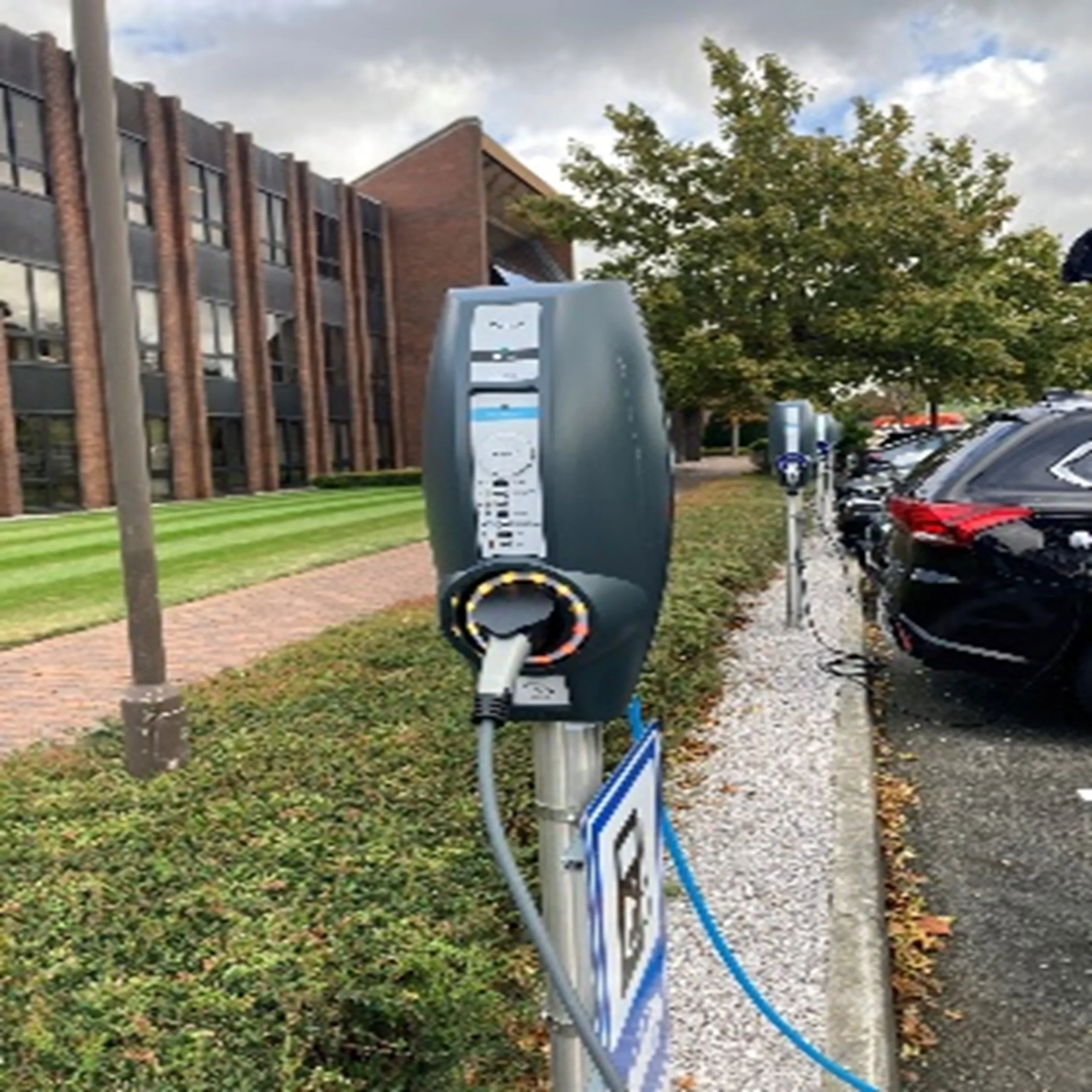 EV charging point in use with charging cable connected, installed by MARA Electrical in Deeside — EV charger installers North Wales