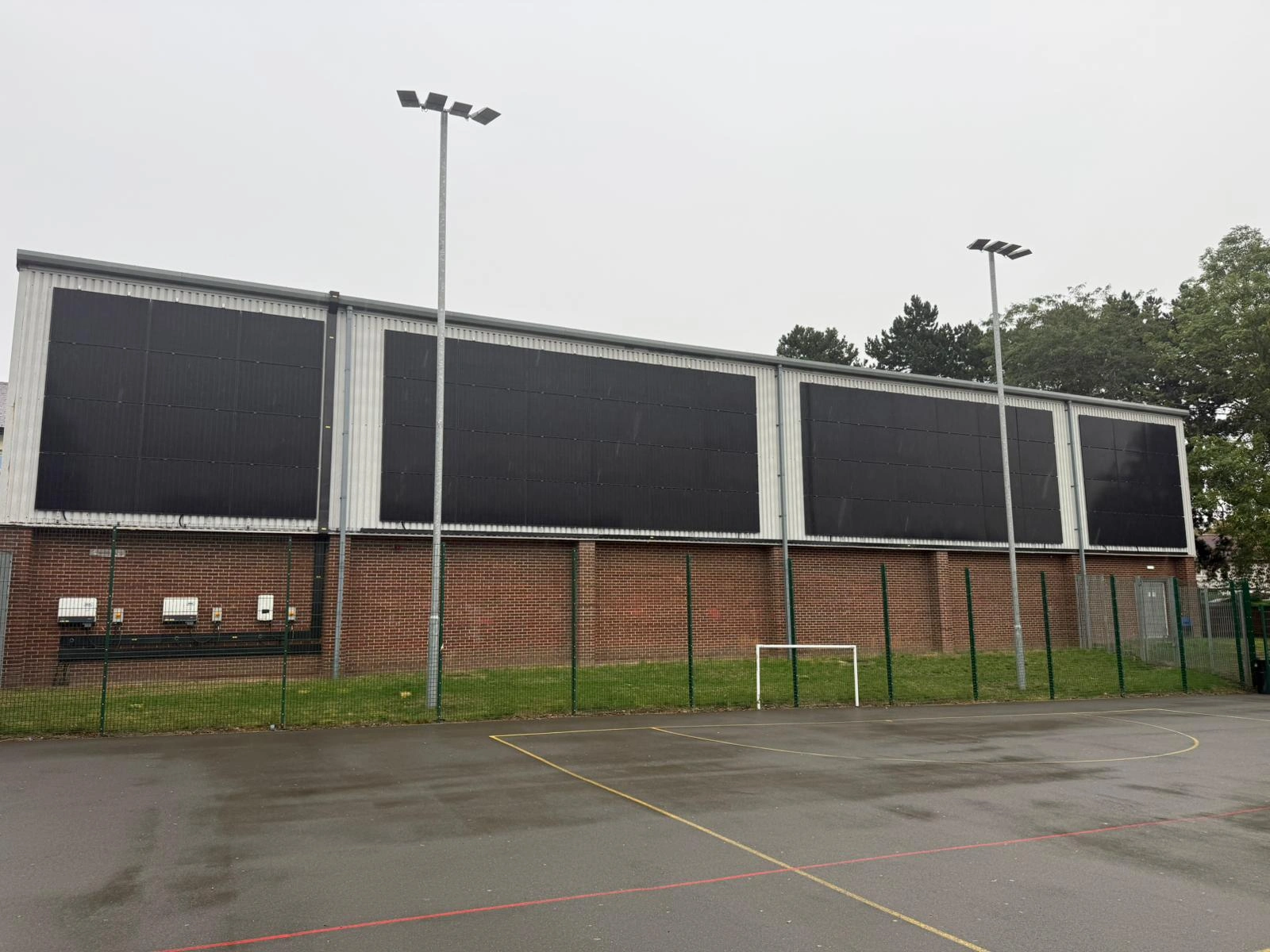 Vertical building-integrated photovoltaic facade installed by MARA Electrical in Deeside, Flintshire — solar panel installers North Wales