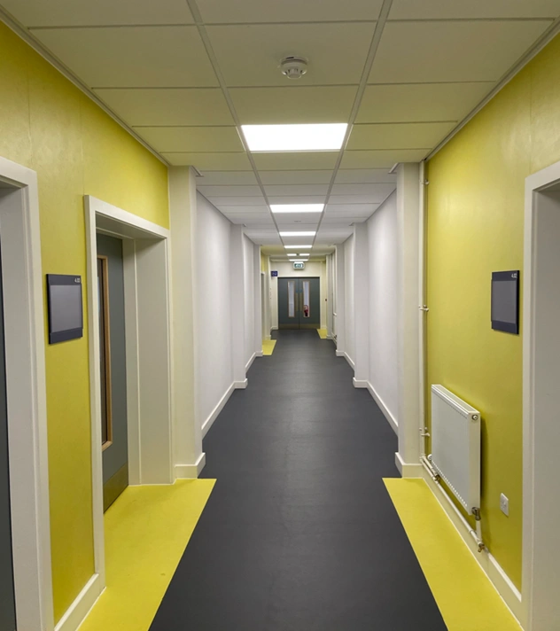Teaching corridor with lighting and emergency lighting installed by MARA Electrical at LJMU