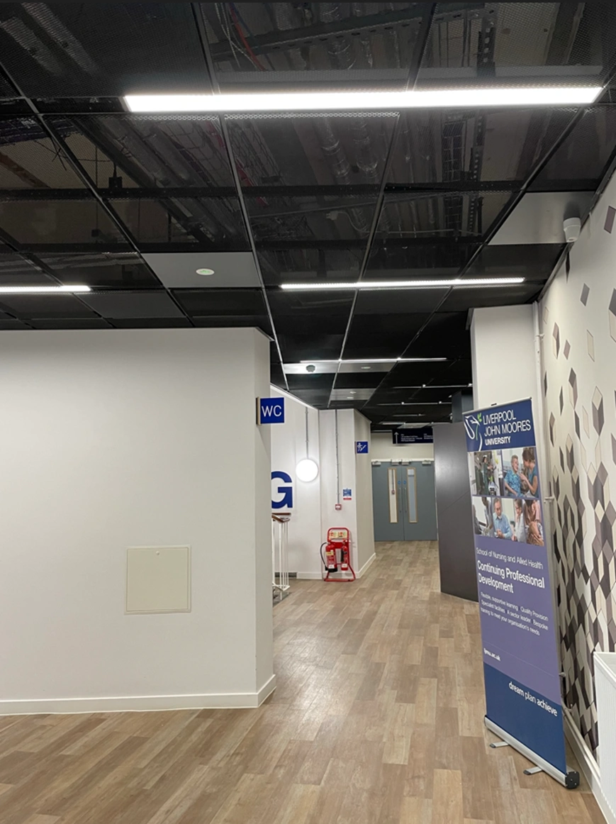 Exposed services and linear lighting installed by MARA Electrical at LJMU Tithebarn Street