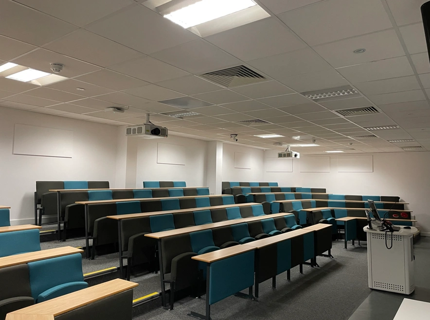 Tiered lecture theatre with lighting and AV power installed by MARA Electrical at Liverpool John Moores University